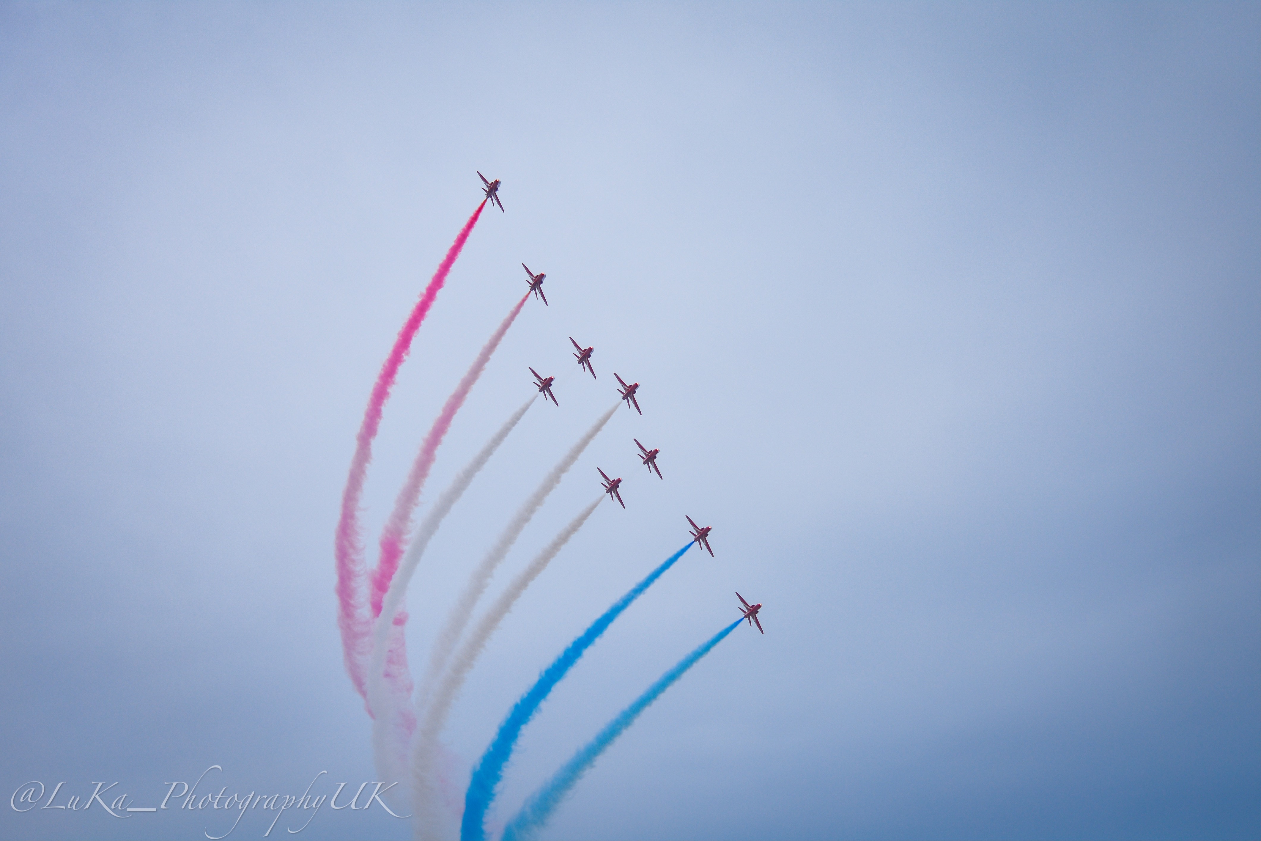 Red Arrows trailing smoke over Donna Nook.
